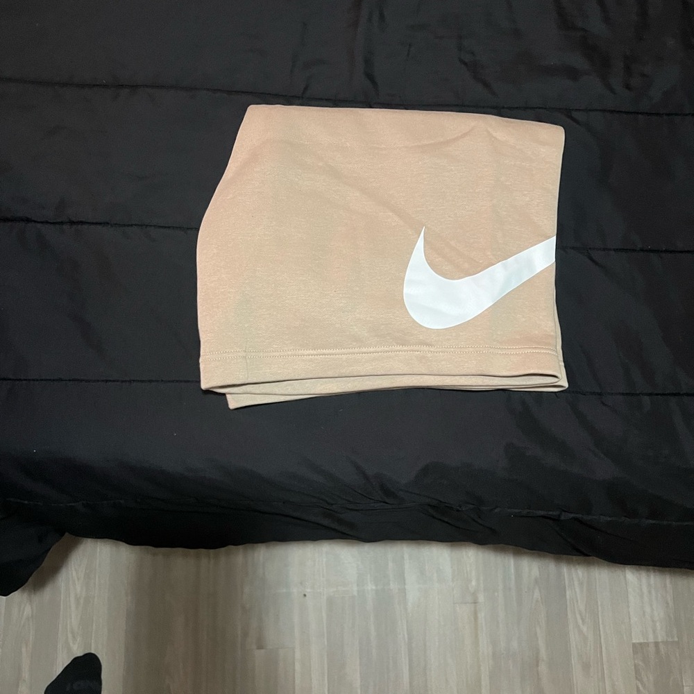 Cream color Nike long shorts
